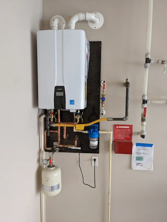 Professional plumber installing copper piping in a Shavano Park home